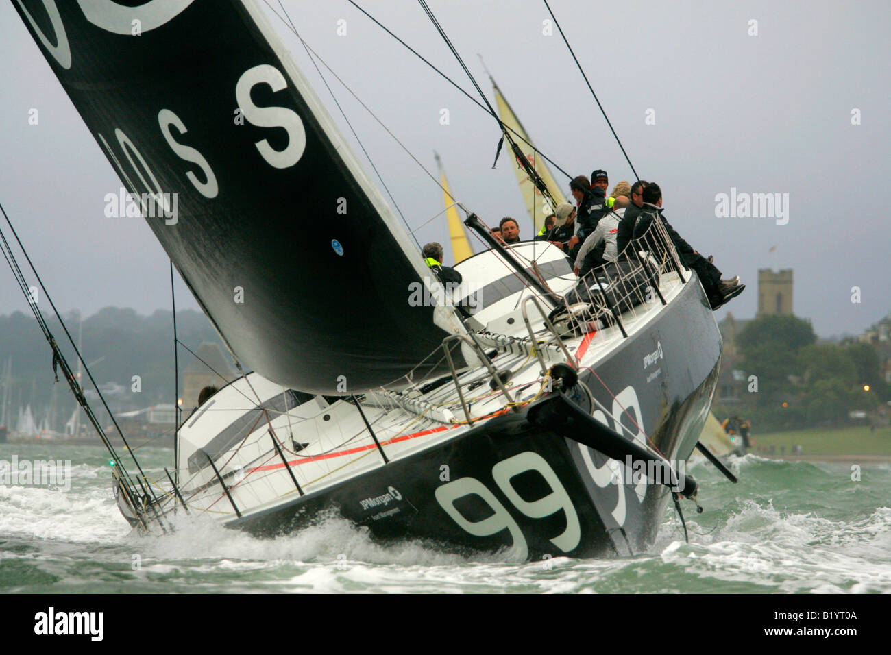 Alex Thomson Ben Ainslie Lewis Hamilton Hugo Boss J P Morgan Round The Island Race Start Cowes isle of Wight England UK Stock Photo