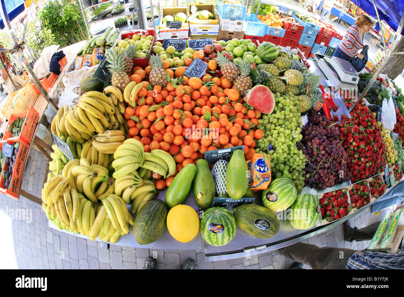 market scenery in Alcudia market stand with exotic fruits Spain Majorca
