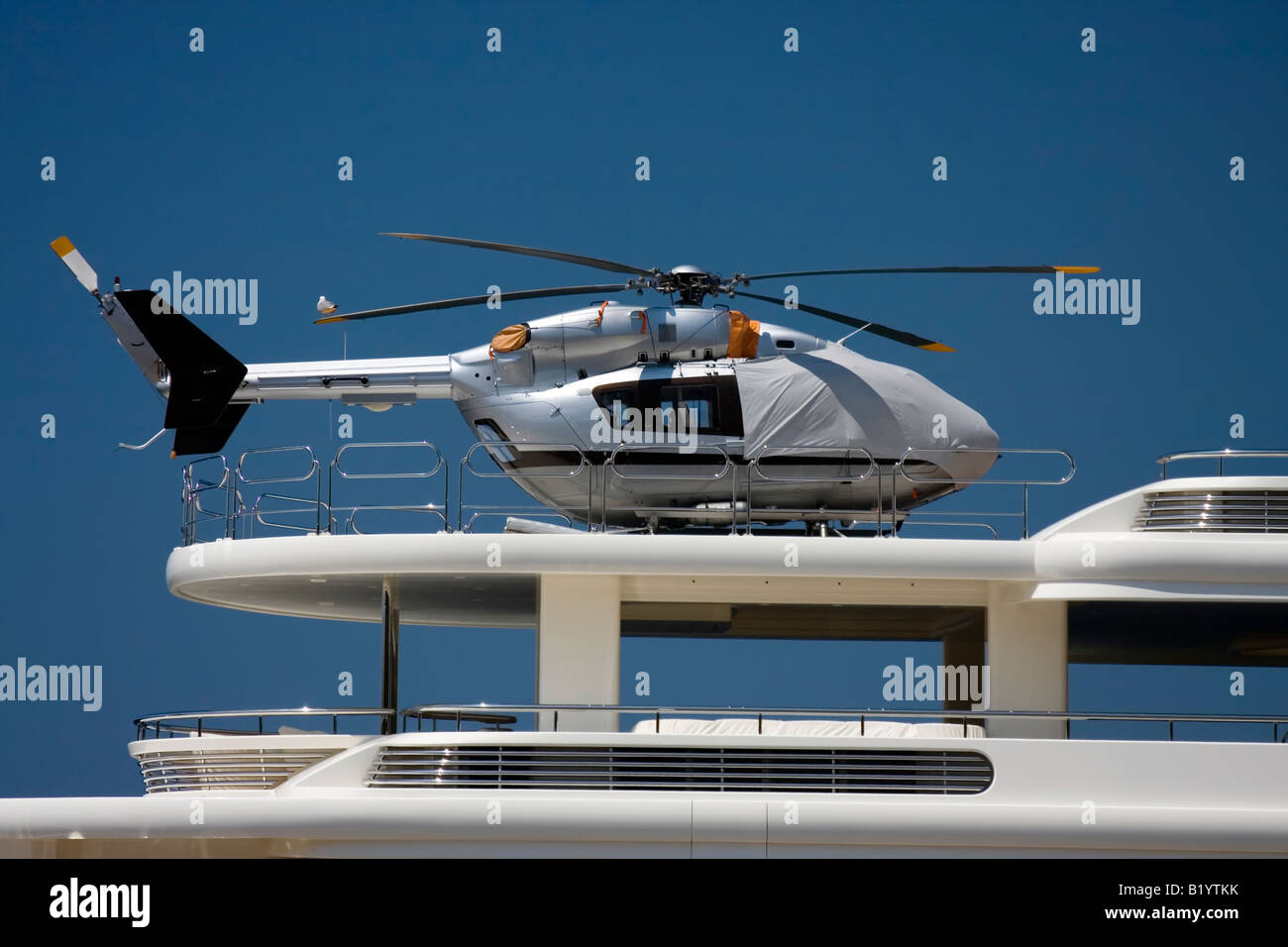 big yacht with helicopter