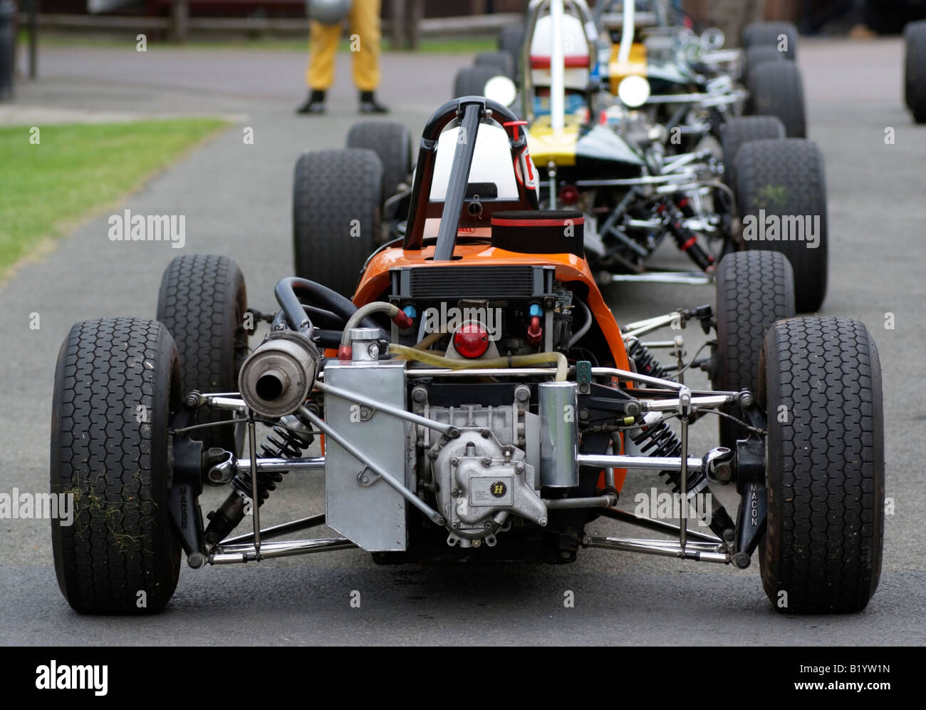 Classic racing and sports race cars in a queue wait to join the track at Prescott Speed Hill Climb in Gloucestershire England UK Stock Photo