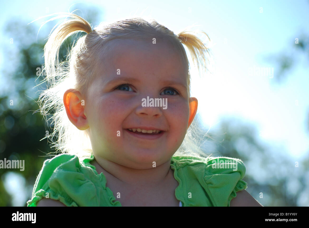 Young Bonde Girl Smiling Stock Photo - Alamy