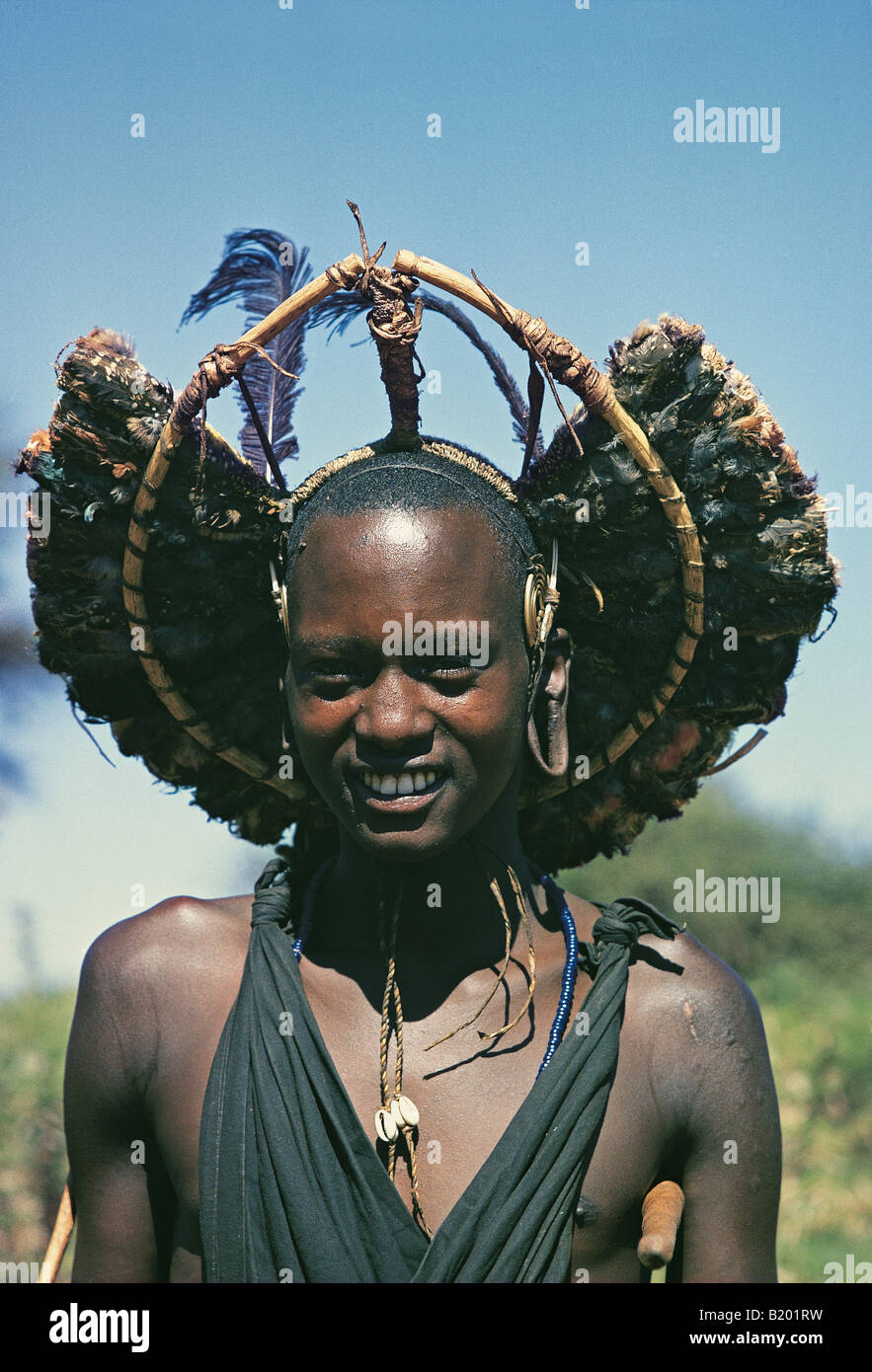 Young Maasai moran with headdress of birds after circumcision South of Ngong Hills Kenya East Africa Stock Photo