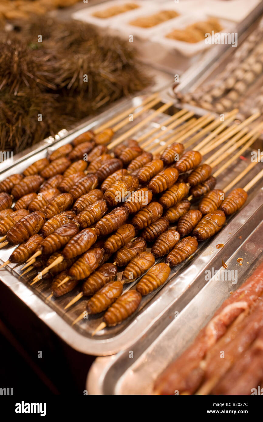Deep fried silkworm skewers for sale in the Night Market Wangfujing