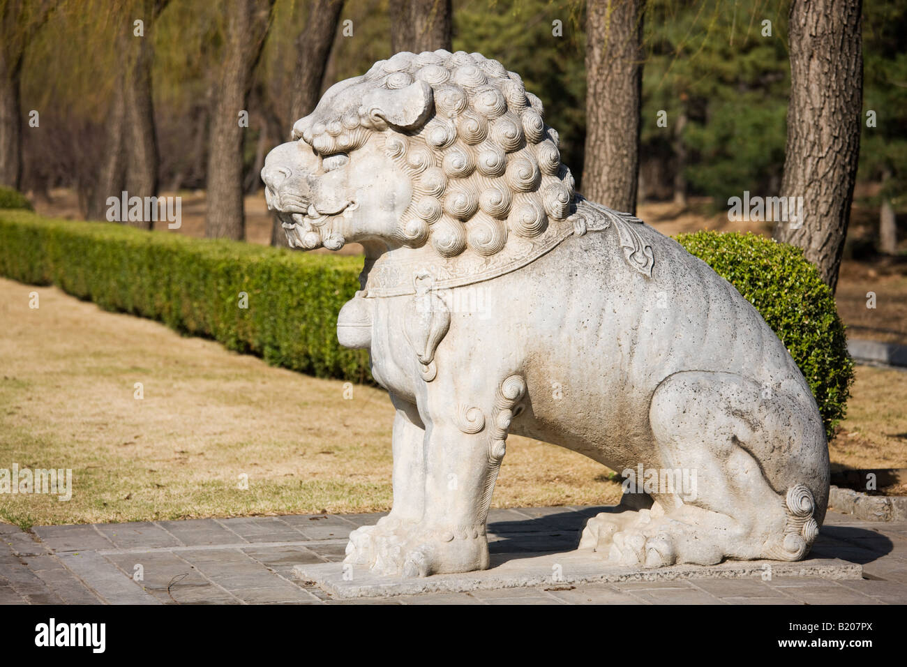Statue of a resting lion Spirit Way Ming Tombs Beijing Peking China Stock Photo