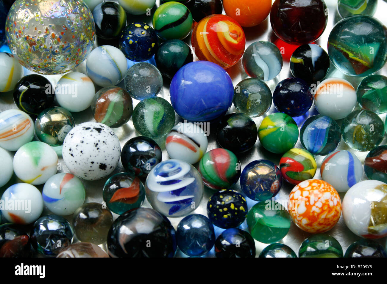 A  childs' collection of colourful marbles Stock Photo