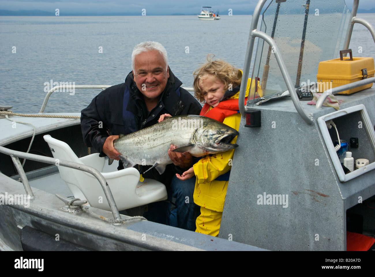 Man holding chinook salmon hi-res stock photography and images - Alamy