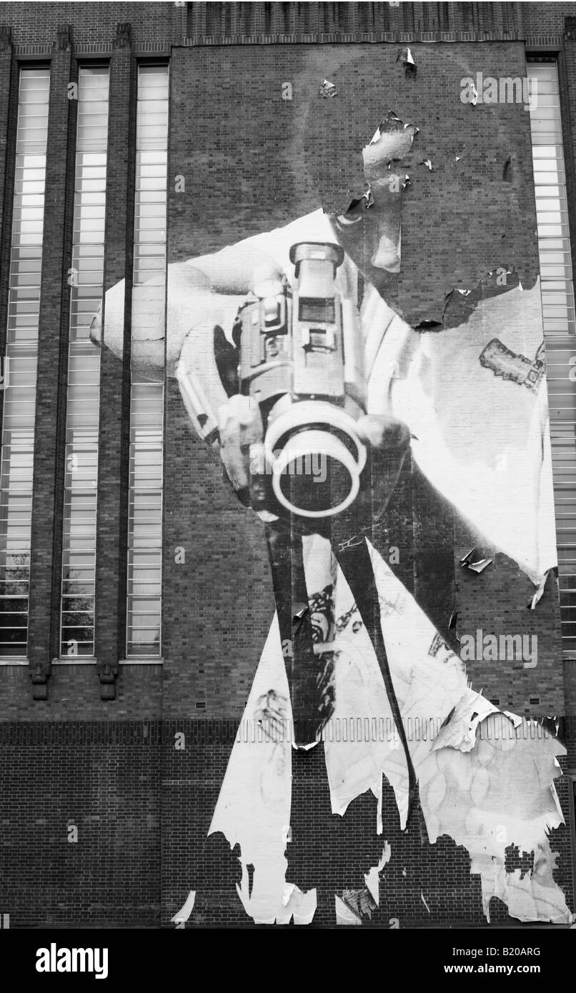 Street Art Depicting a Young Adult Male in Aggressive Pose, on the Outside Wall of the Tate Modern Art Gallery, London. Stock Photo