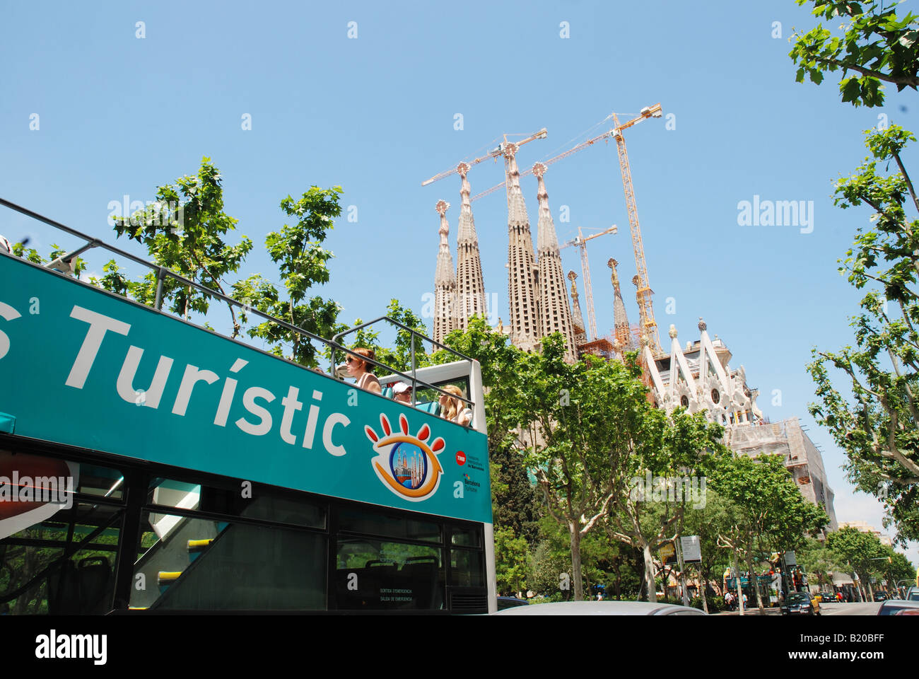 Detail of tourist bus and Sagrada Familia temple. Barcelona. Catalonia. Spain. Stock Photo