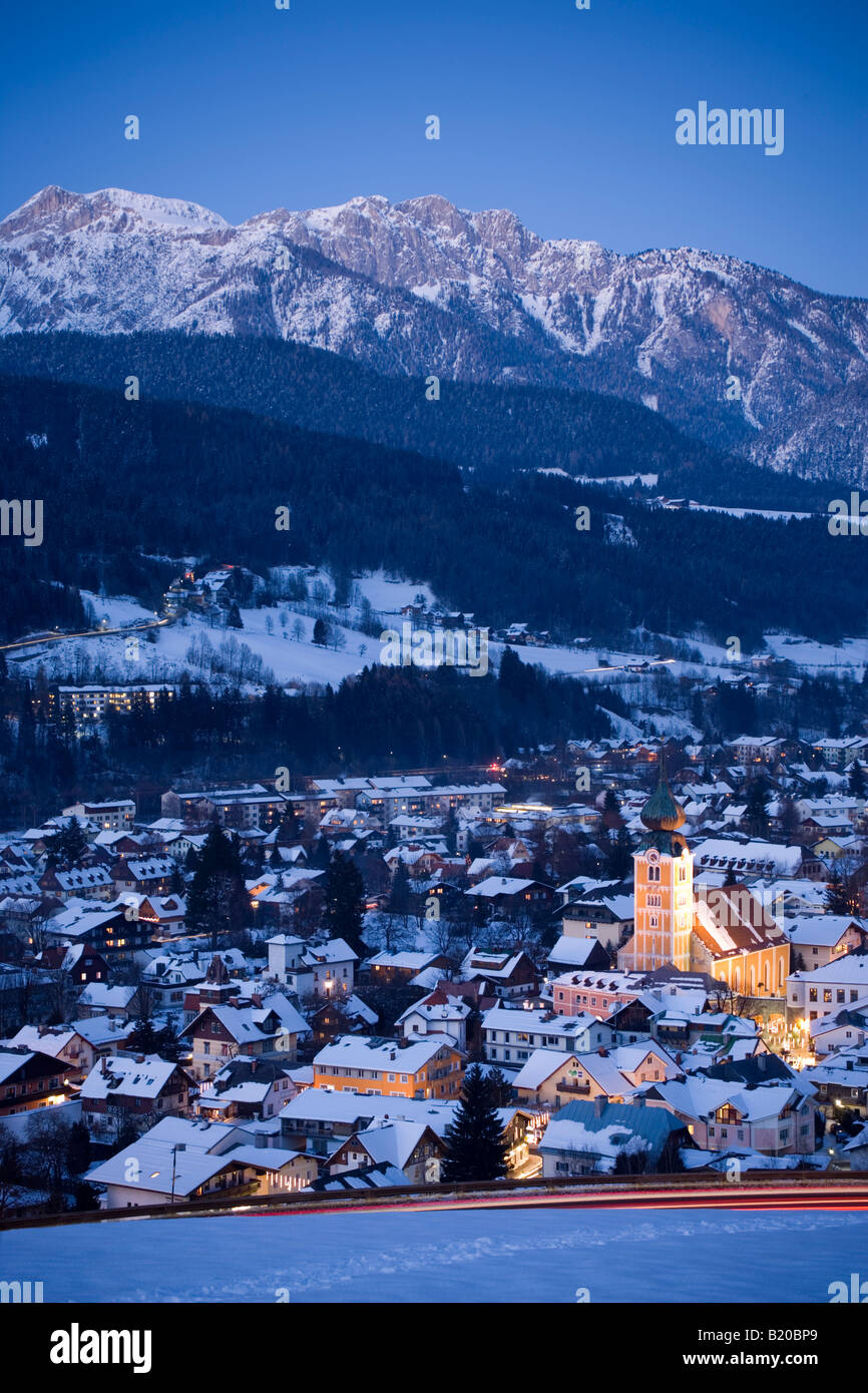 View to the St Achatius church in the evening summit of the Dachsteinregion at horizon Schladming Ski Amade Styria Austria Stock Photo