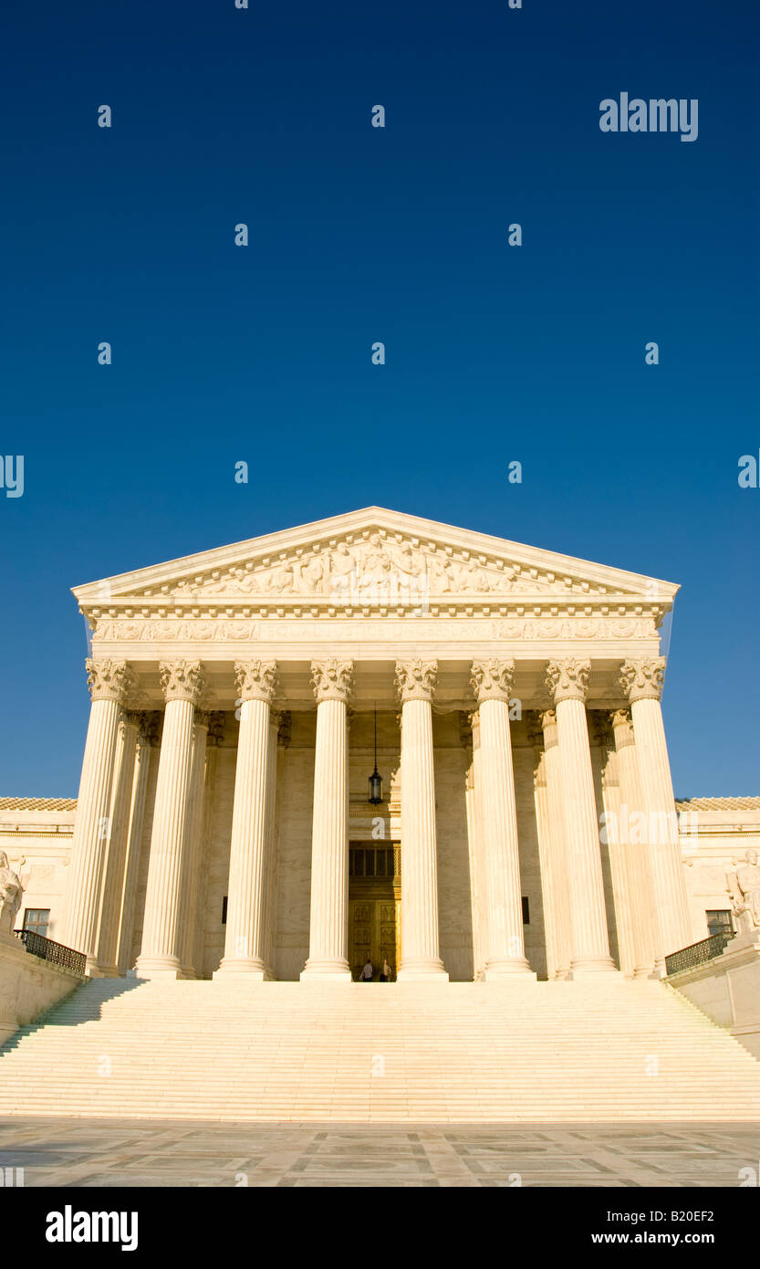 WASHINGTON DC, United States — The US Supreme Court building, located on Capitol Hill in Washington DC, is an iconic example of neoclassical architecture. The building’s grand facade features towering Corinthian columns and a marble staircase leading to the entrance. It serves as the highest judicial authority in the United States and is a major landmark in the nation's capital. Stock Photo