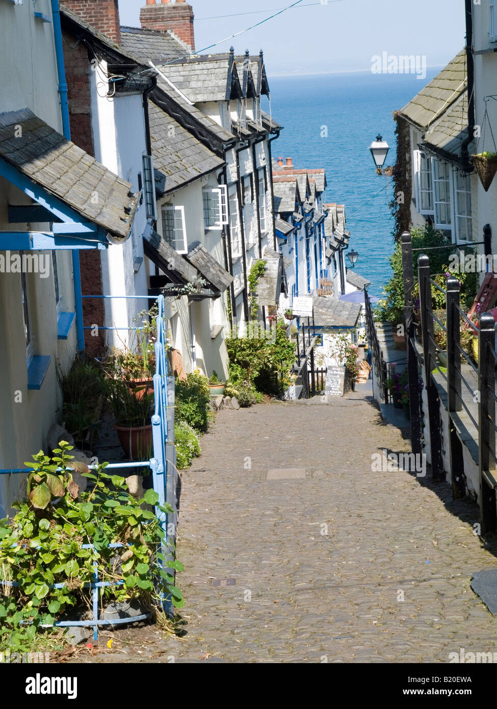 The steep cobbles street leading down to the harbour area in the historic fishing village of Clovelly, North Devon UK Stock Photo