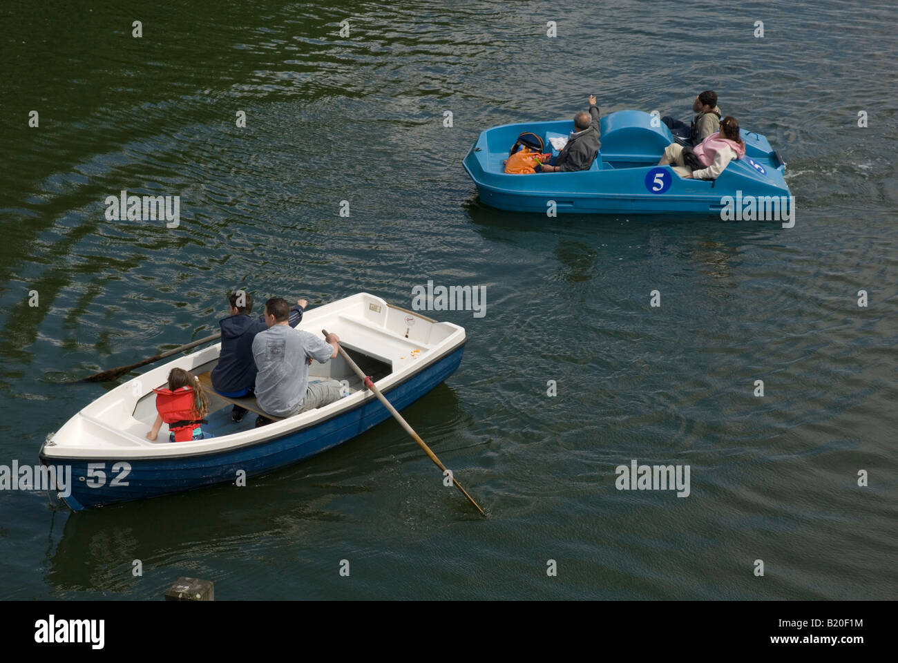 Persons in rowing and paddle boats, Lake Serpentine, Hyde Park, London