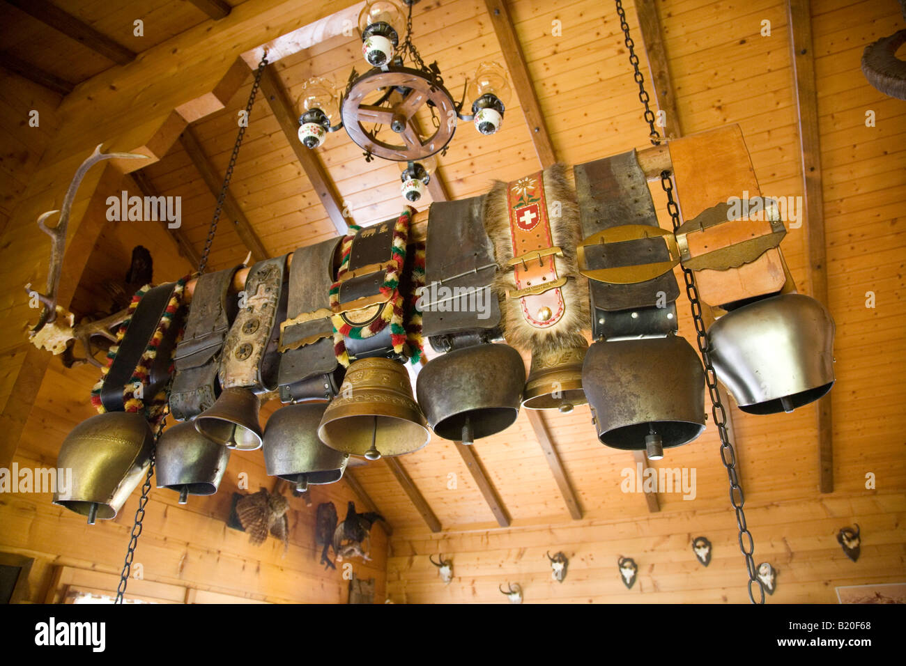 Swiss cow bells hanging in Jaegerstube restaurant in village of Zmutt