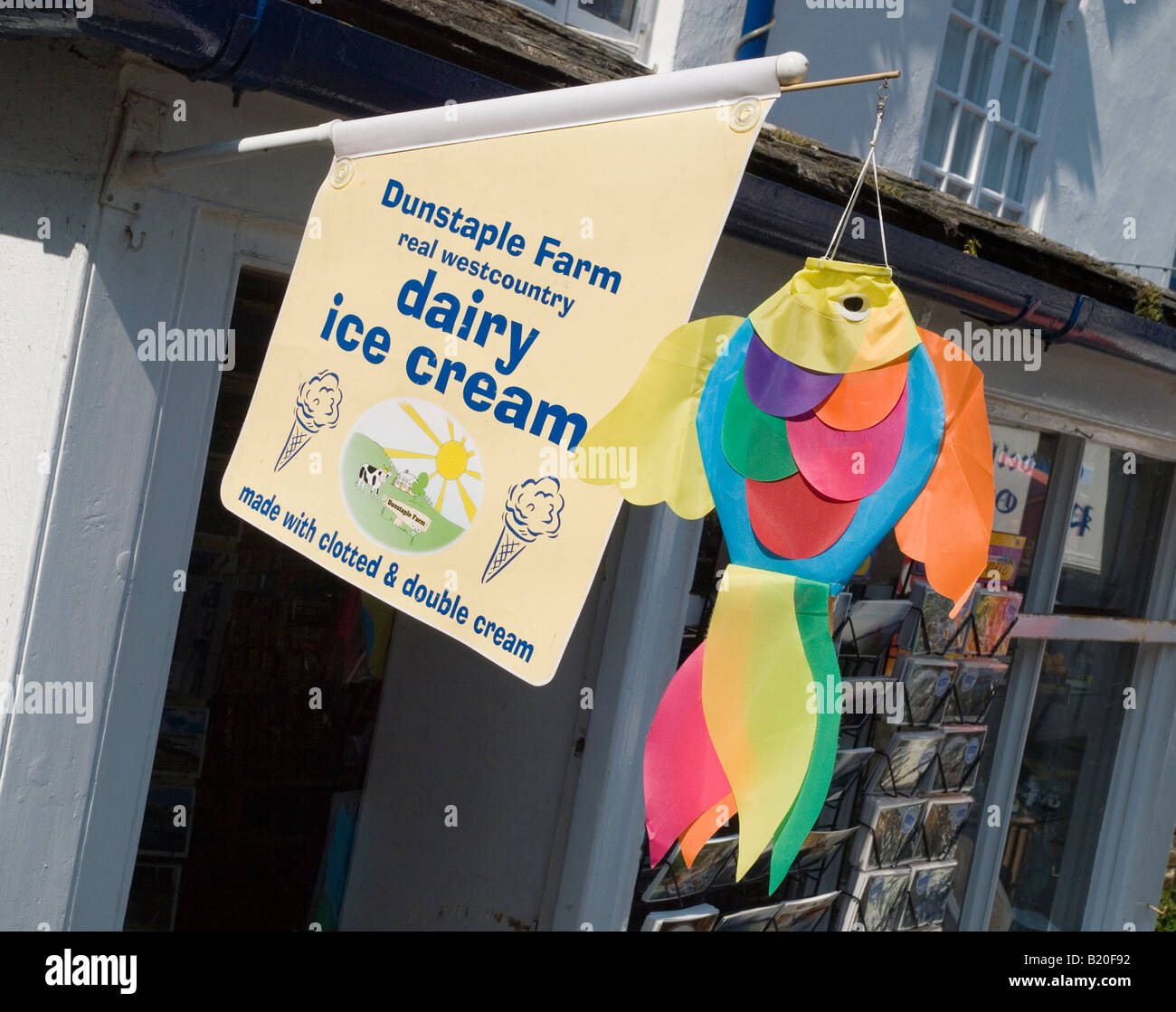 A colourful fish and sign outside a shop advertising 'west country dairy ice cream' in the village of  Clovelly North Devon UK Stock Photo