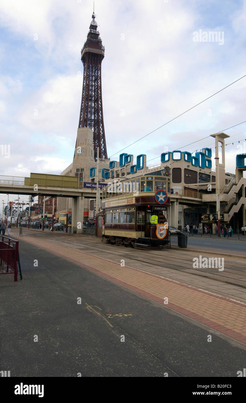 Tram on the Golden Mile, Blackpool, Lancashire with Blackpool Tower in bckground Stock Photo