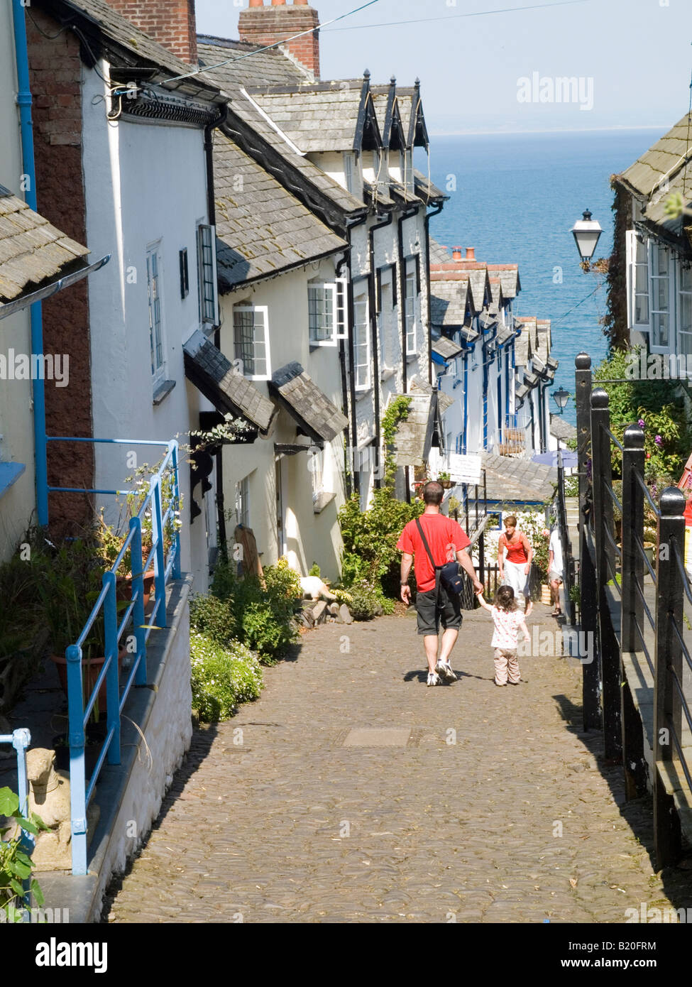The cobbled street leading down to the harbour area, in the historic fishing village of Clovelly, North Devon England UK Stock Photo