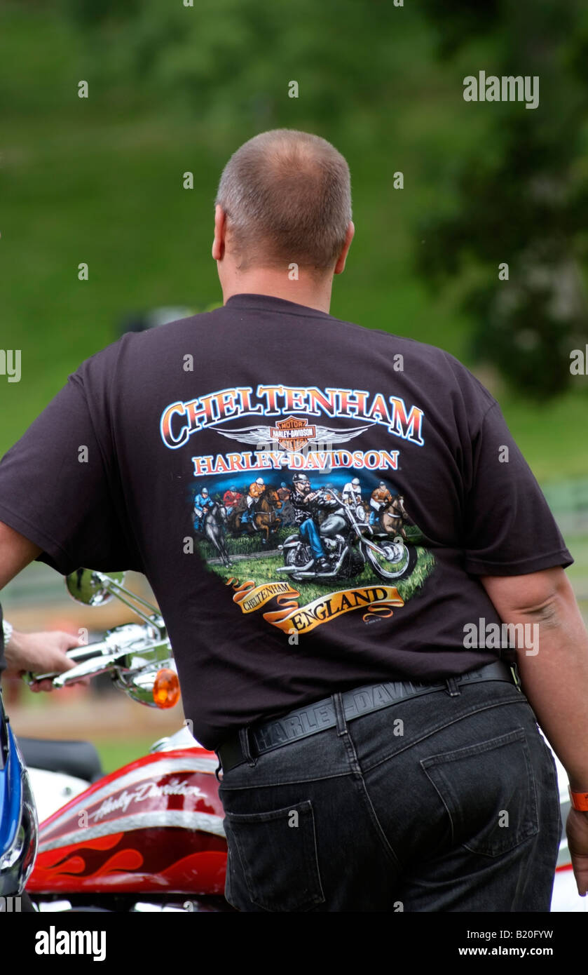 Man wearing a Cheltenham Harley Davidson T shirt Stock Photo - Alamy