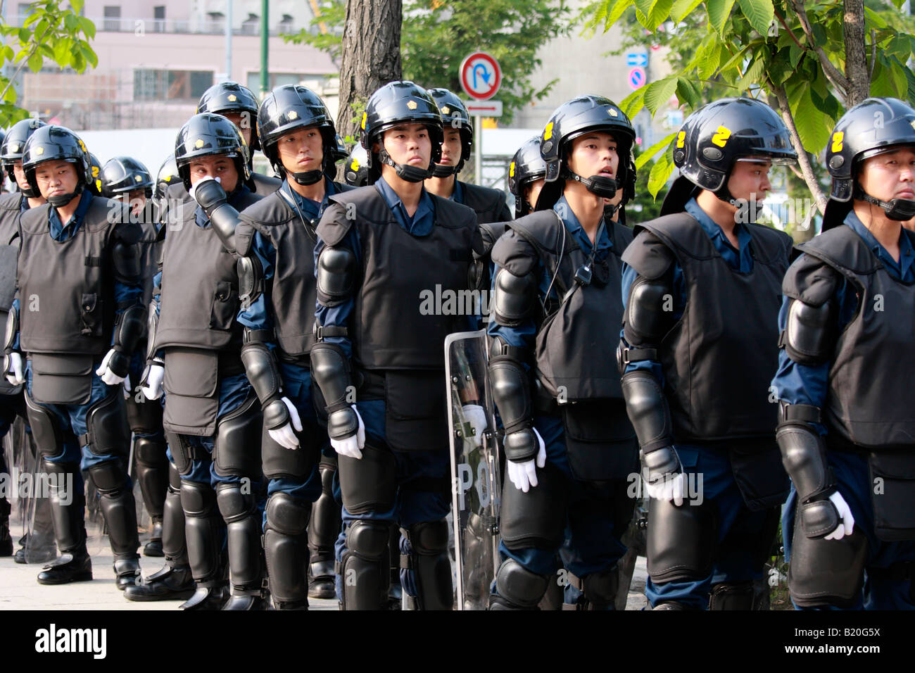 Japanese Police officers wearing riot gear at the G8 summit in Sapporo. Stock Photo