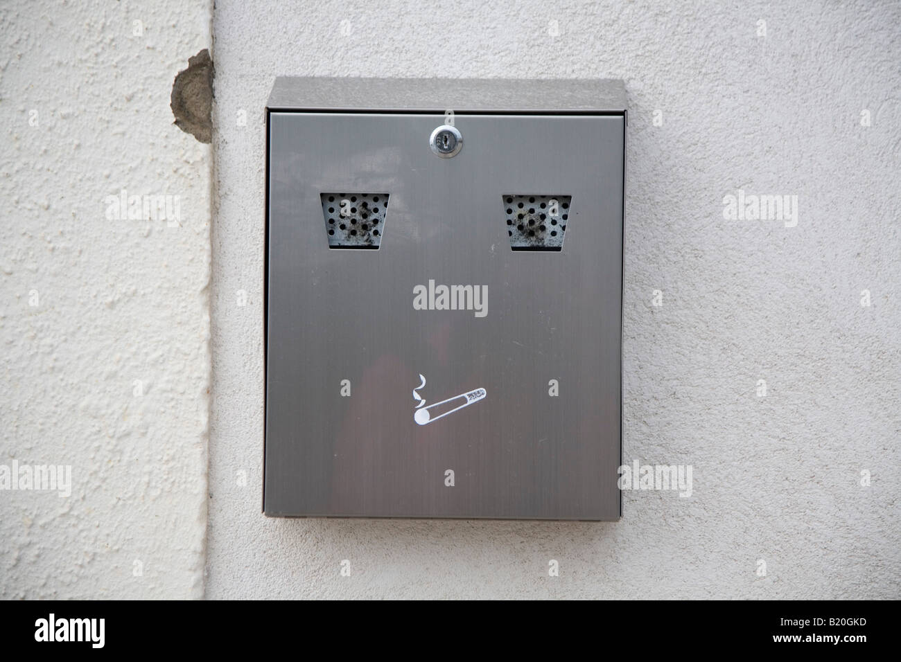 modern ash tray on a house wall in Wales, UK Stock Photo