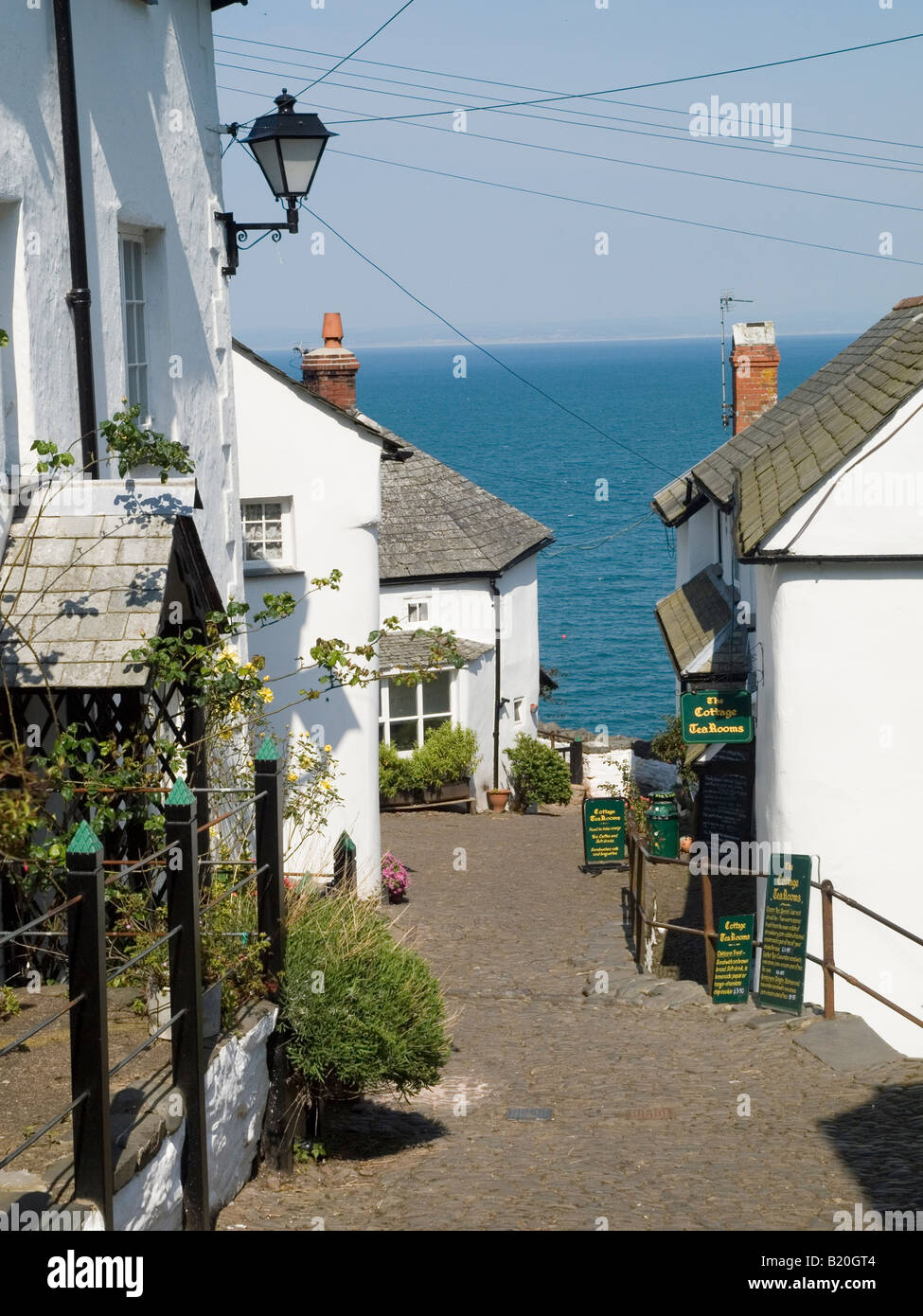 The cobbled street leading down to the harbour area in the historic fishing village of Clovelly, North Devon England UK Stock Photo