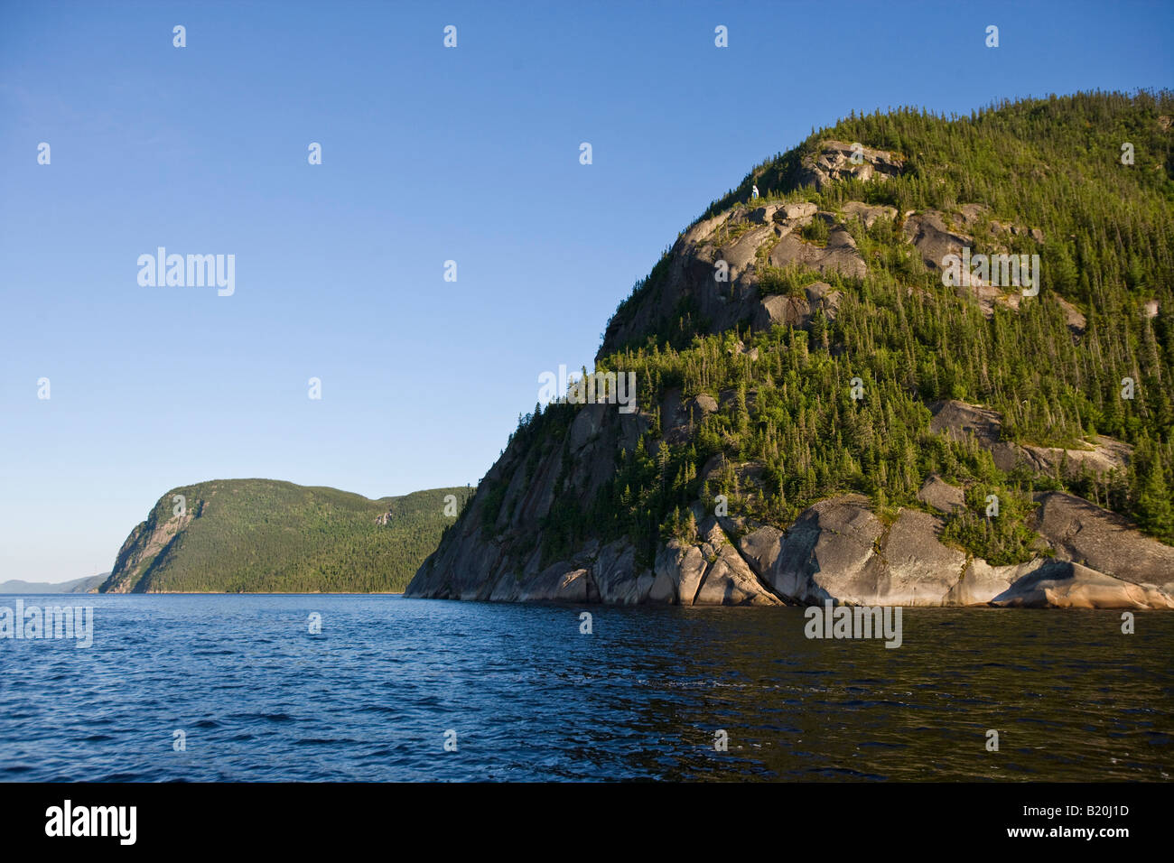 Cap Eternite (right) and Cap Liberte (left) in the Saguenay Fjord in Saguenay National Park. Quebec, Canada. Stock Photo