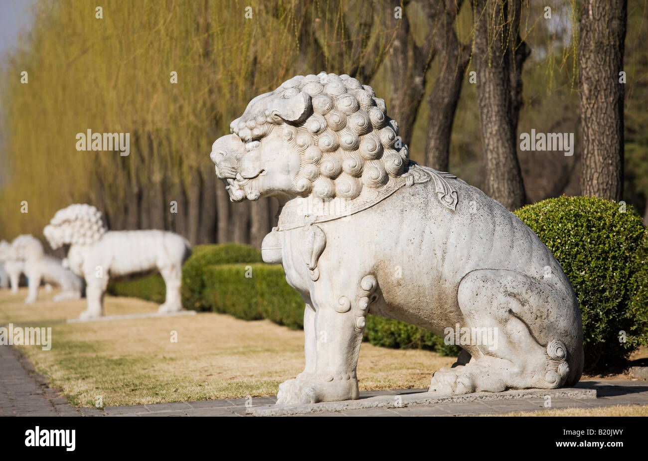 Statue of a resting lion Spirit Way Ming Tombs Beijing Peking China Stock Photo