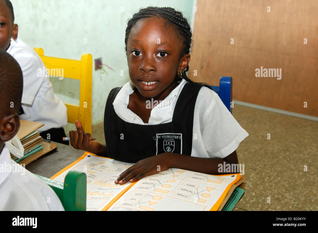 Attentive girl of a primary class at the De Youngsters International School, Accra, Ghana Stock Photo