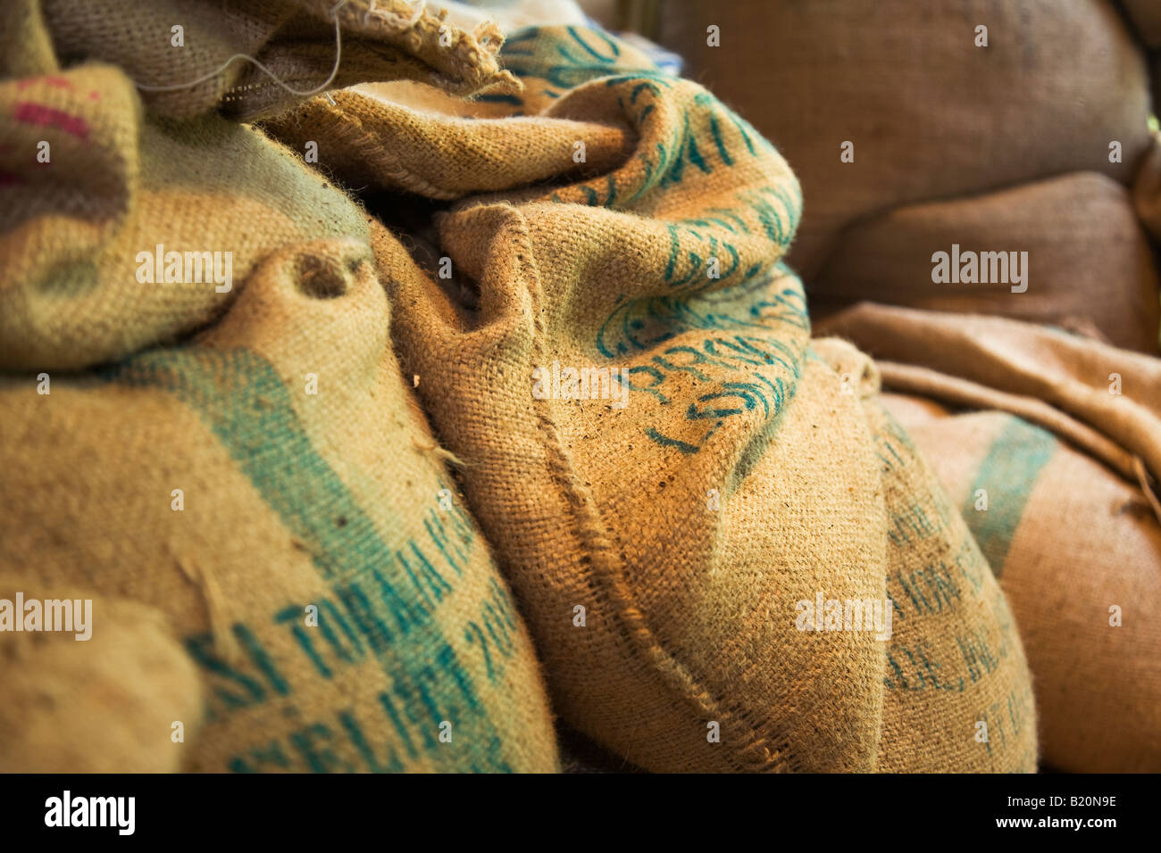 ILLINOIS Riverwoods Burlap bag with green coffee beans Name and origin stencil on side of sack Stock Photo