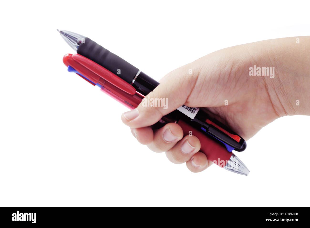 child's hand holding mechanical pen and pencil on white background Stock Photo