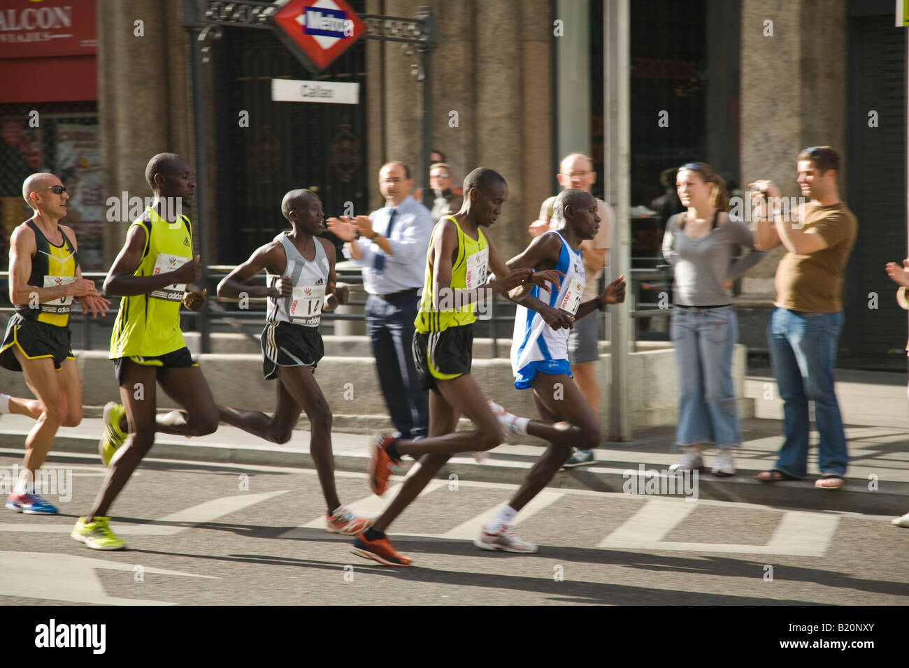 SPAIN Madrid Runners in marathon race on Gran Via Street Spanish runner Chema Martinez in leader pack with Kenyans Stock Photo