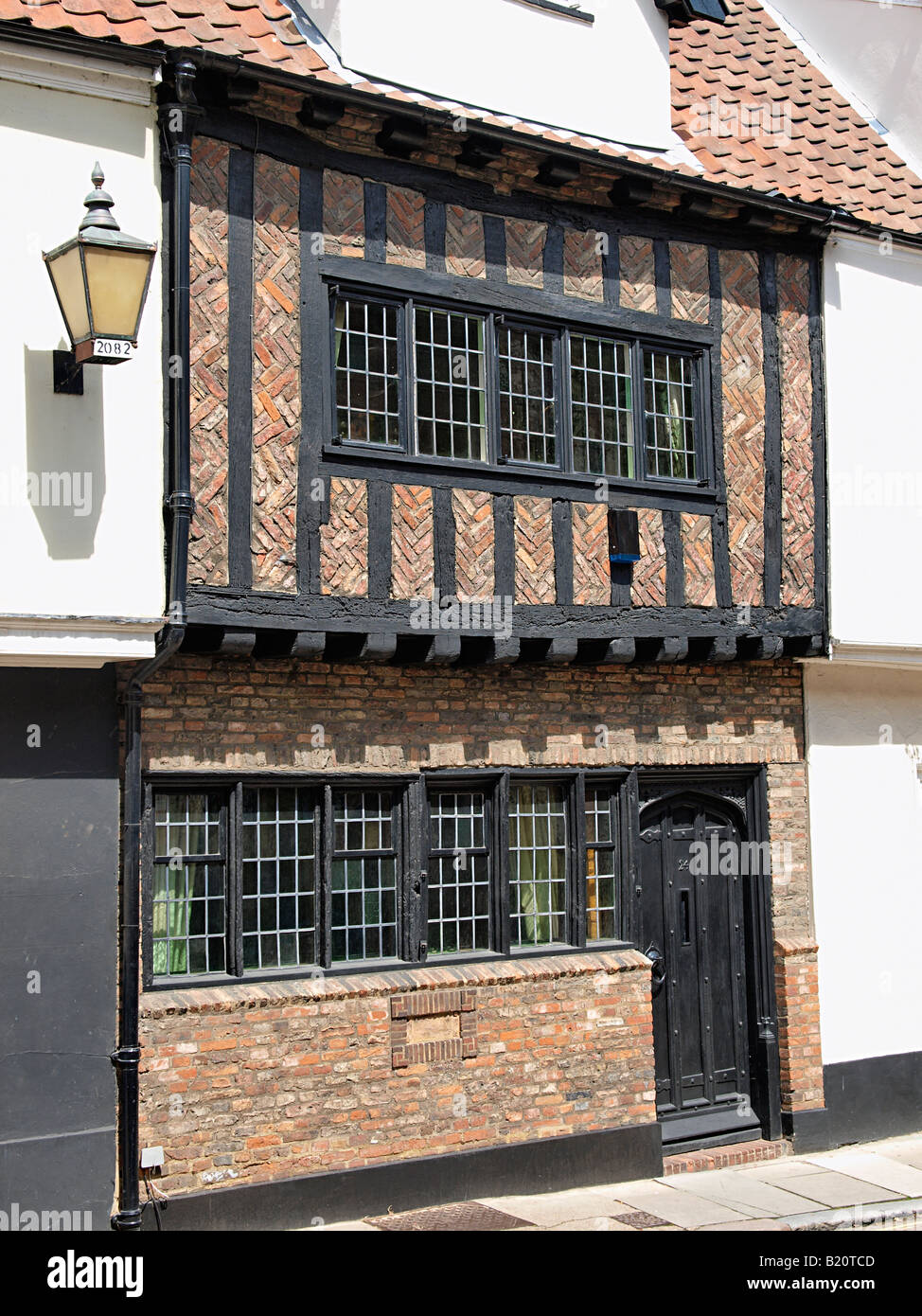 HOUSE WITH EXPOSED BRICK AND TIMBER FRAME ON PRINCES STREET NORWICH NORFOLK ENGLAND UK Stock Photo