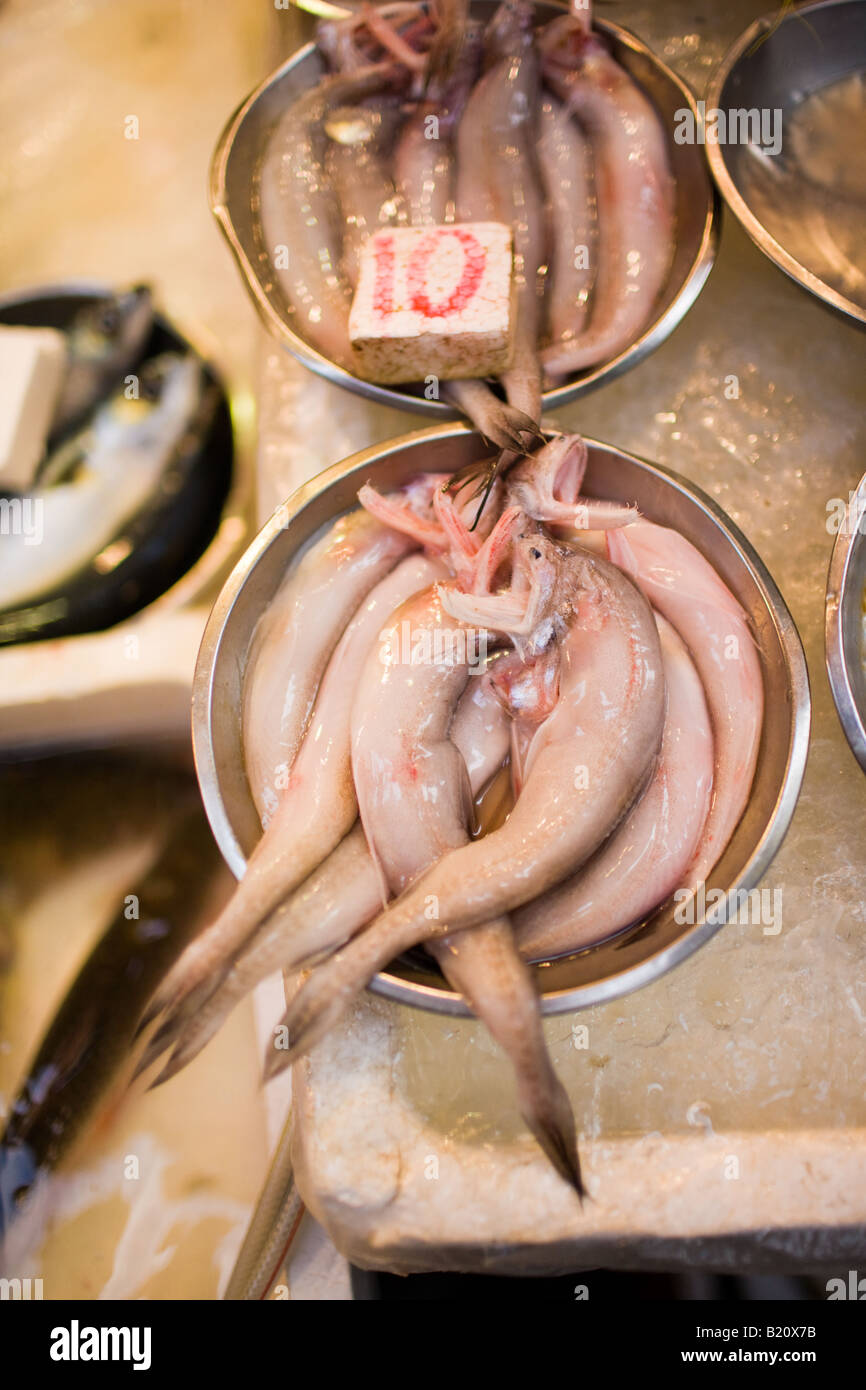 Fresh fish on sale in traditional old Chinese Soho food market in Graham Street Central Hong Kong China Stock Photo