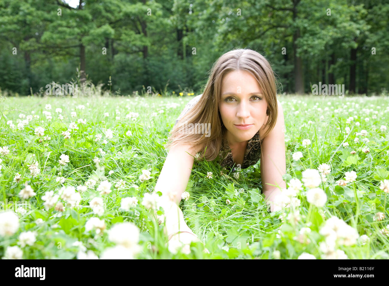 Beautiful Young Women In The Summer Park Stock Photo - Alamy