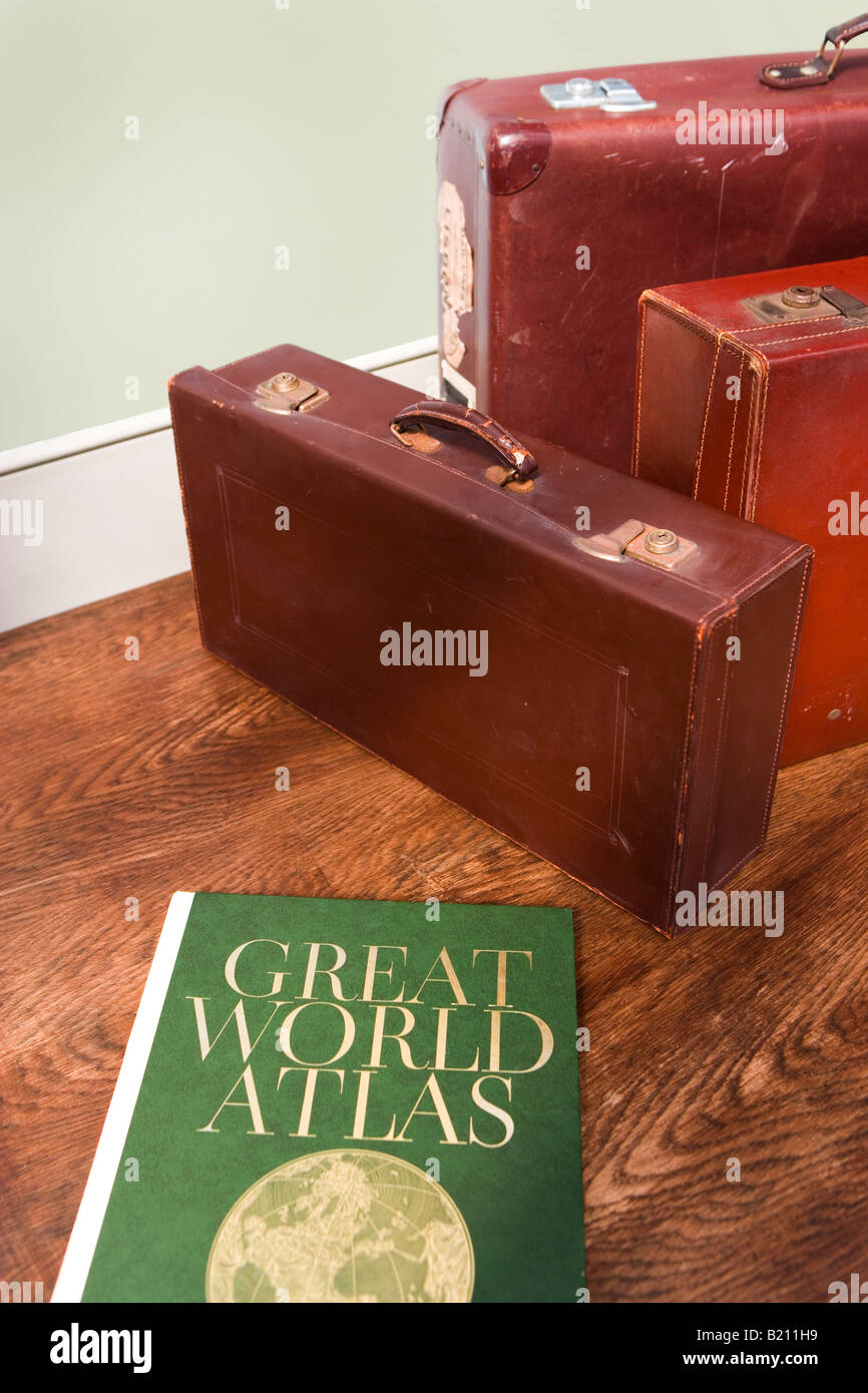 Vintage leather cases and Atlas Stock Photo