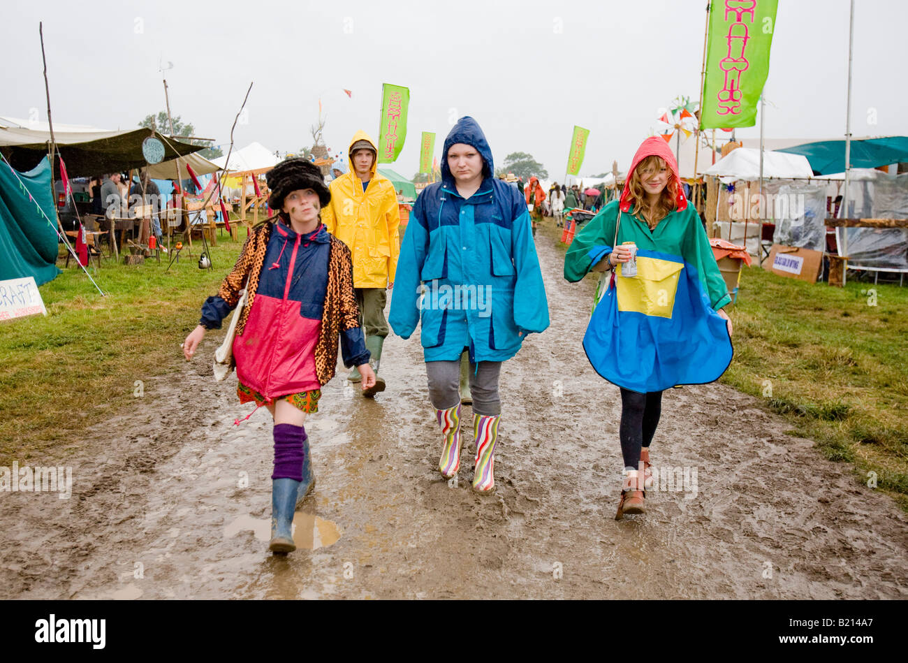 People Walking In Mud Glastonbury Festival Pilton Somerest UK Europe Stock Photo