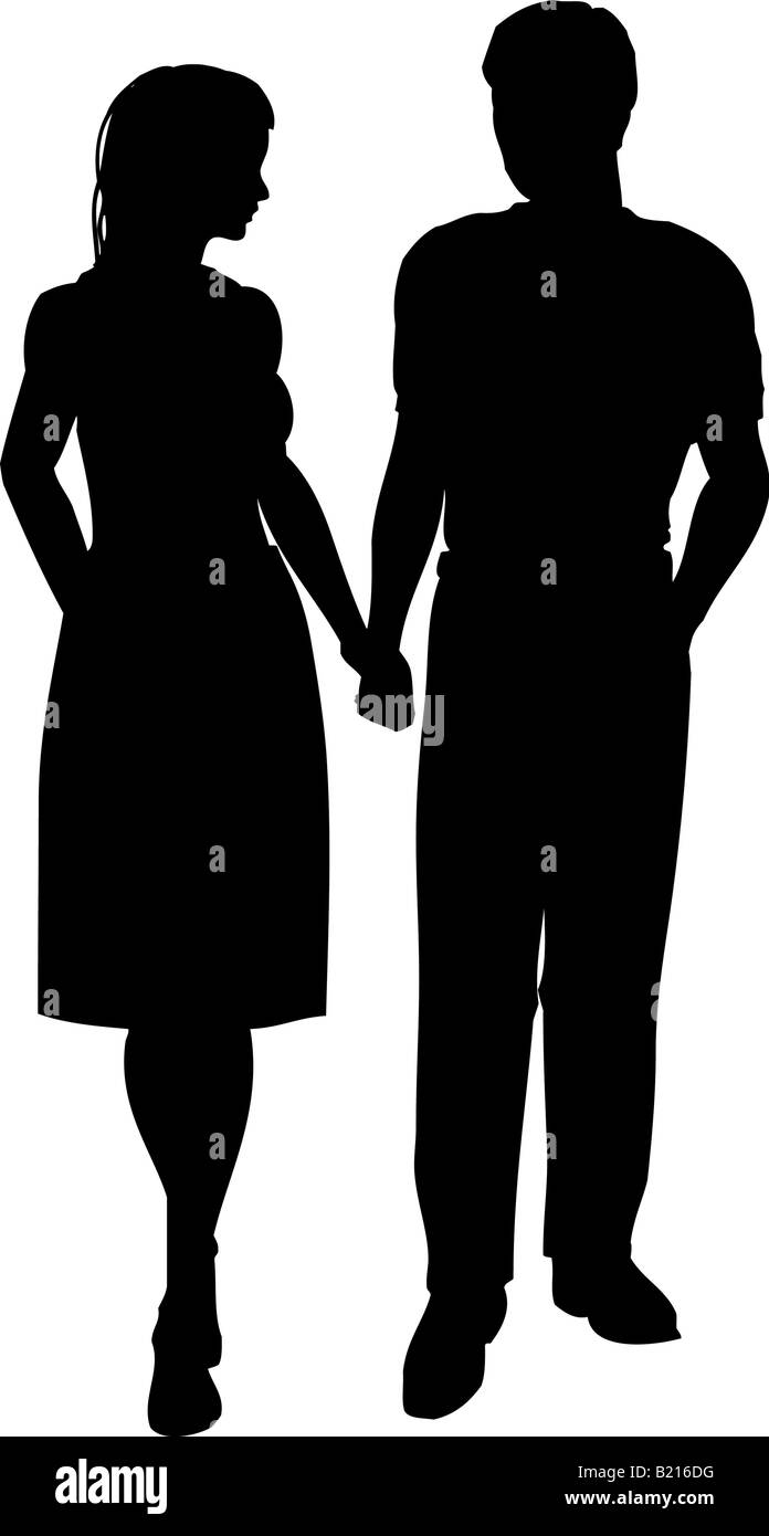 Silhouette of a couple walking Stock Photo - Alamy