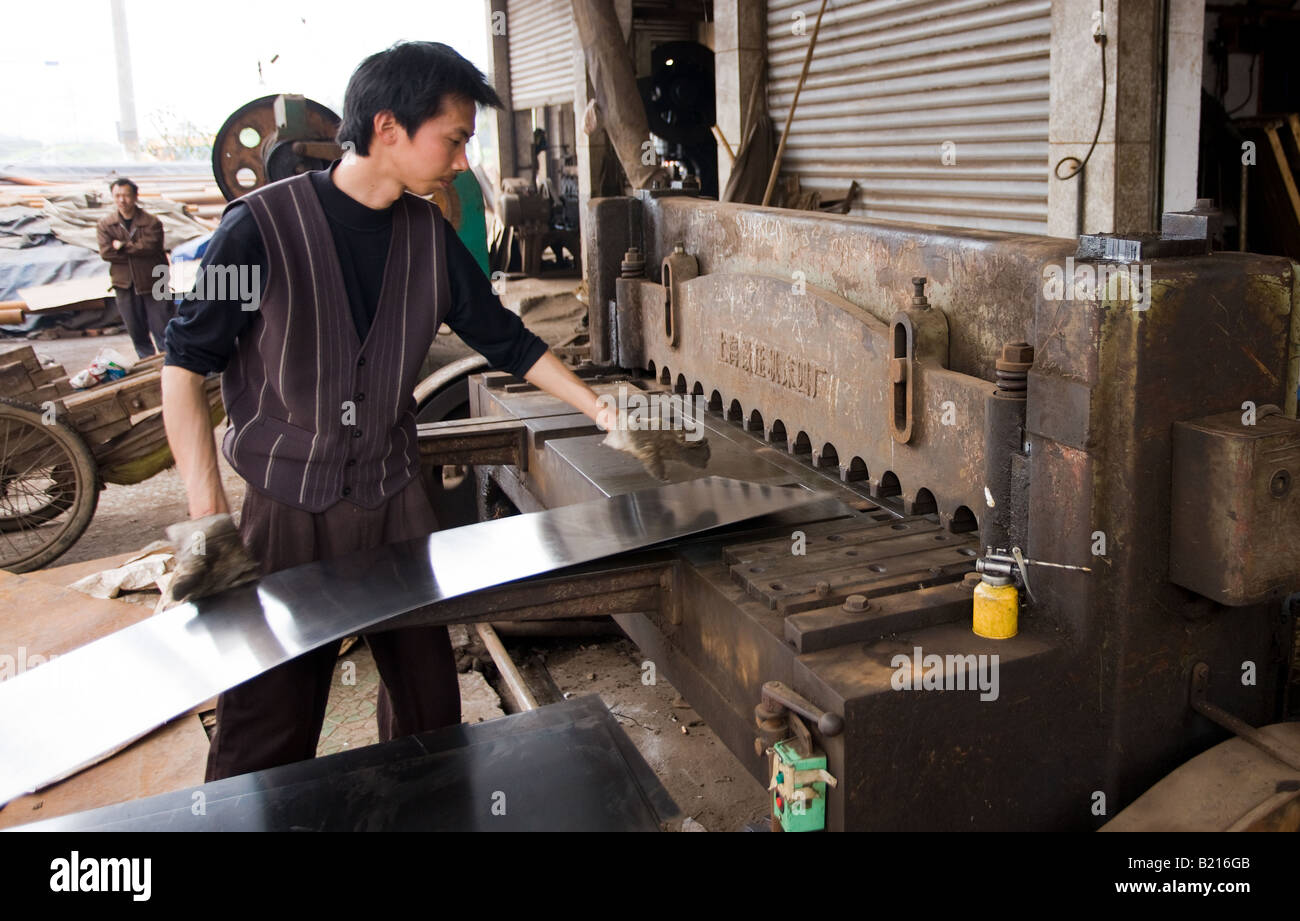 Man working at metal recycling steel in Dazu County Chongqing China Stock Photo