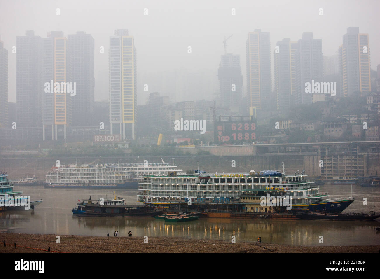 Pleasure cruisers from Victoria Line awaiting Western passengers for Yangtze River cruise Chongqing China Stock Photo
