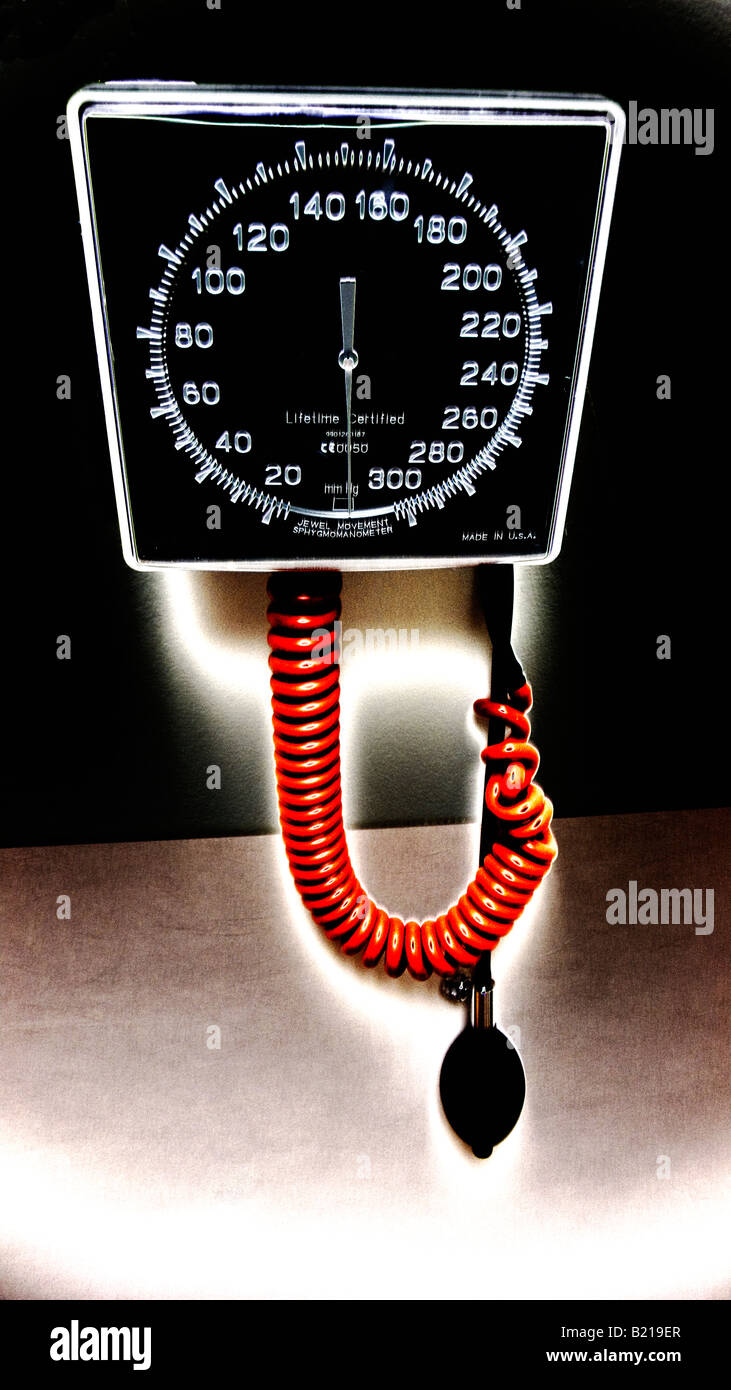 wall aneroid sphygmomanometer in hospital digitally altered Stock Photo