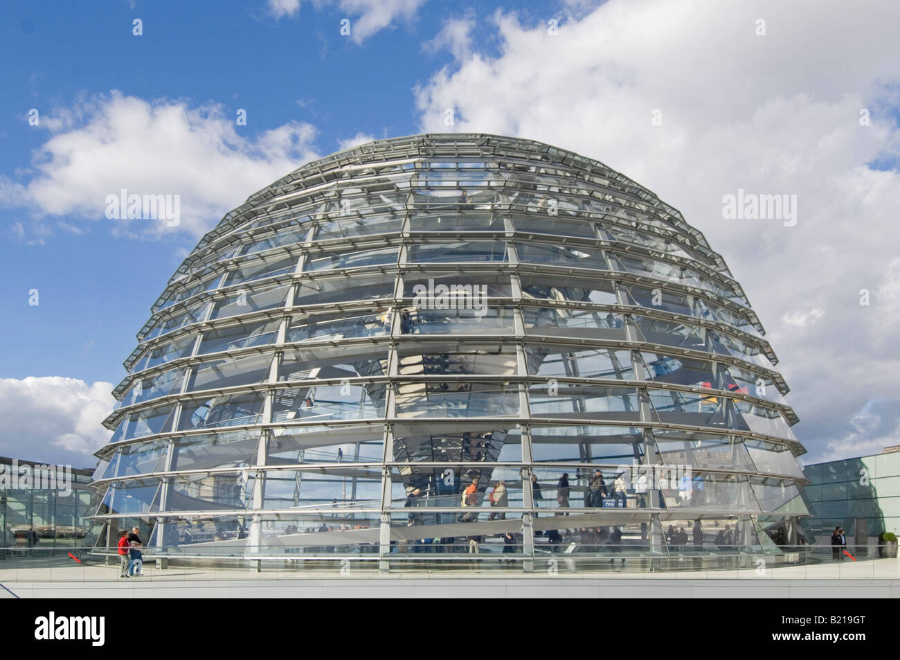 An exterior view of tourists inside the dome on top of the Reichstag - the german parliment building. Stock Photo