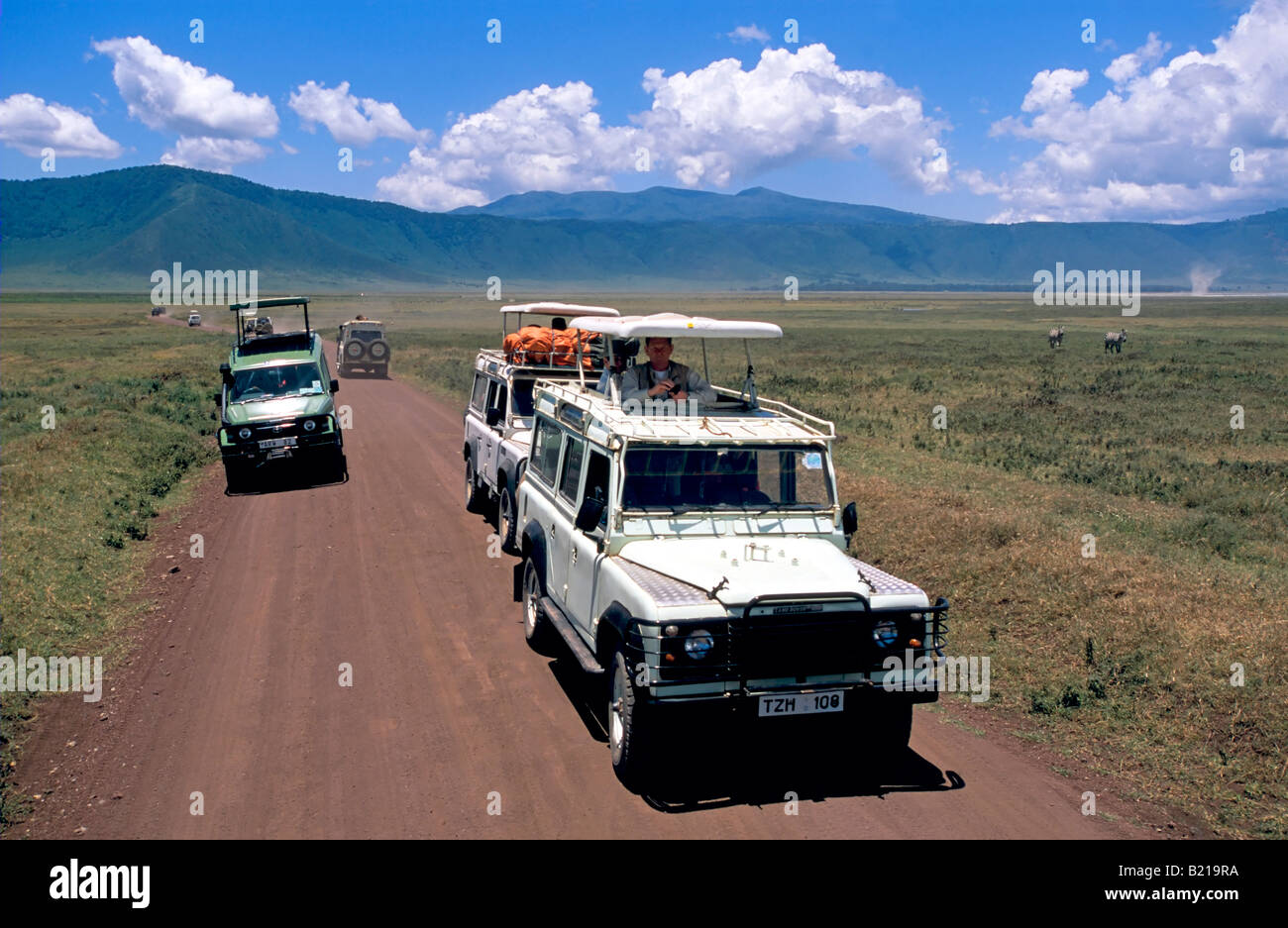 Congestion of tourist 4wd vehicles in the Ngorongoro Crater while game viewing. Stock Photo