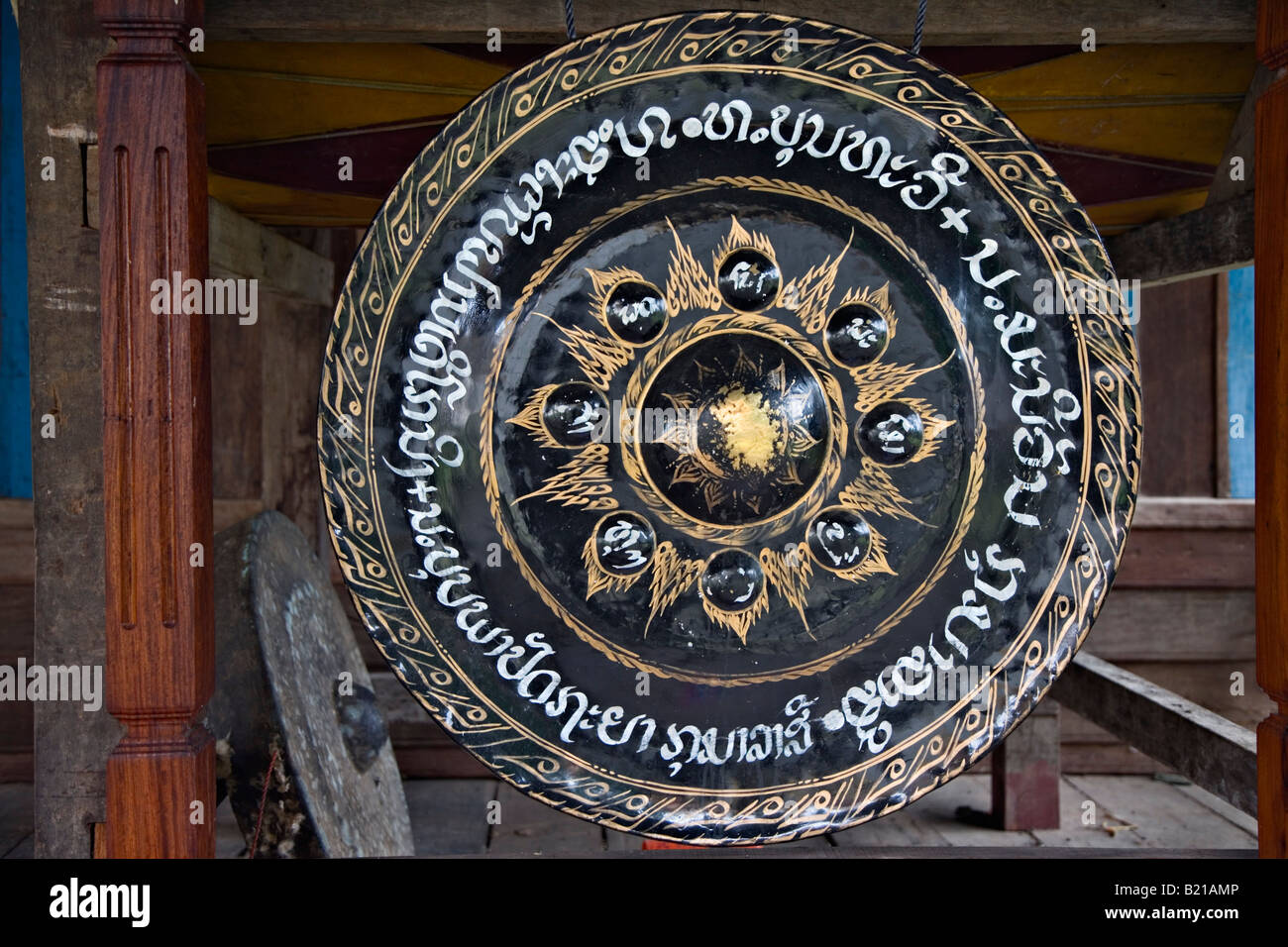 Ceremonial gong in rural, Buddhist temple, southern Laos Stock Photo
