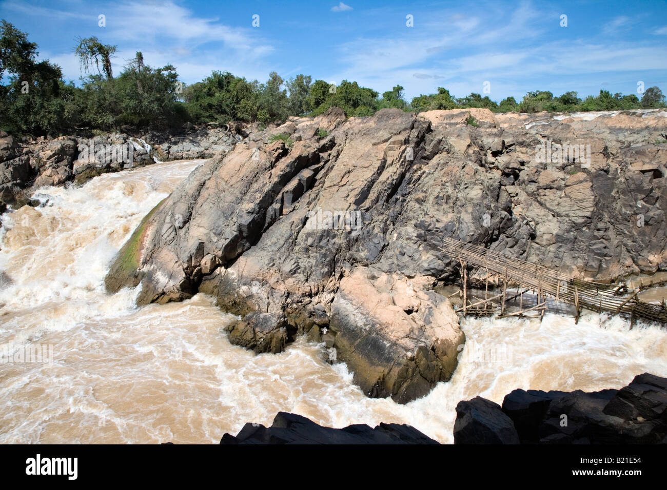 Tad Somphamit or Li Phi waterfalls with fish trap on the Mekong River, southern Laos Stock Photo