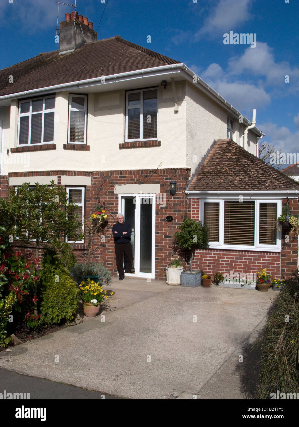 SUBURBAN SEMI DETACHED HOUSE WITH CONVERTED GARAGE AND 