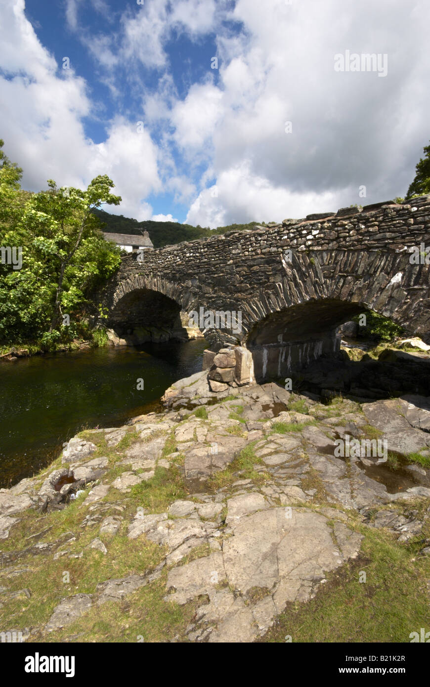 Stone Bridge and Cottage Stock Photo