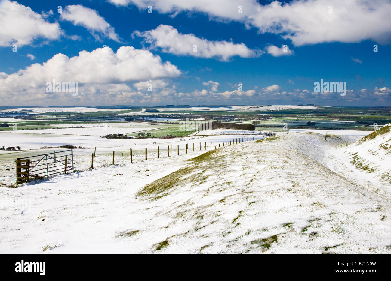 Snow over the Marlborough Downs in Wiltshire, England, UK taken from a rampart at Liddington Castle, an iron age hillfort. Stock Photo