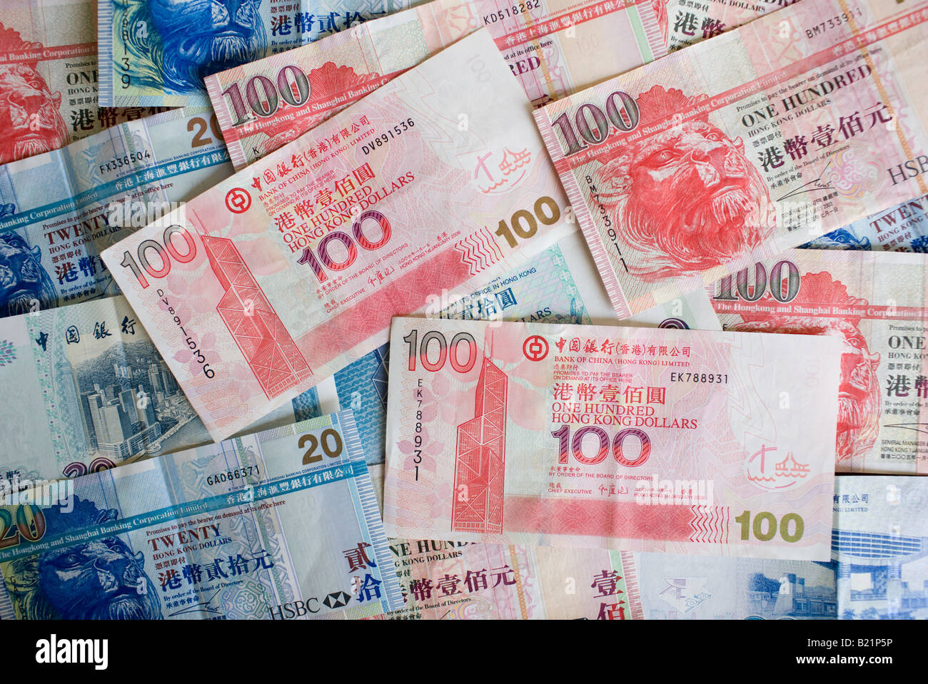 Hong Kong Dollar bills feature image of the Bank of China Building Hong Kong China Stock Photo