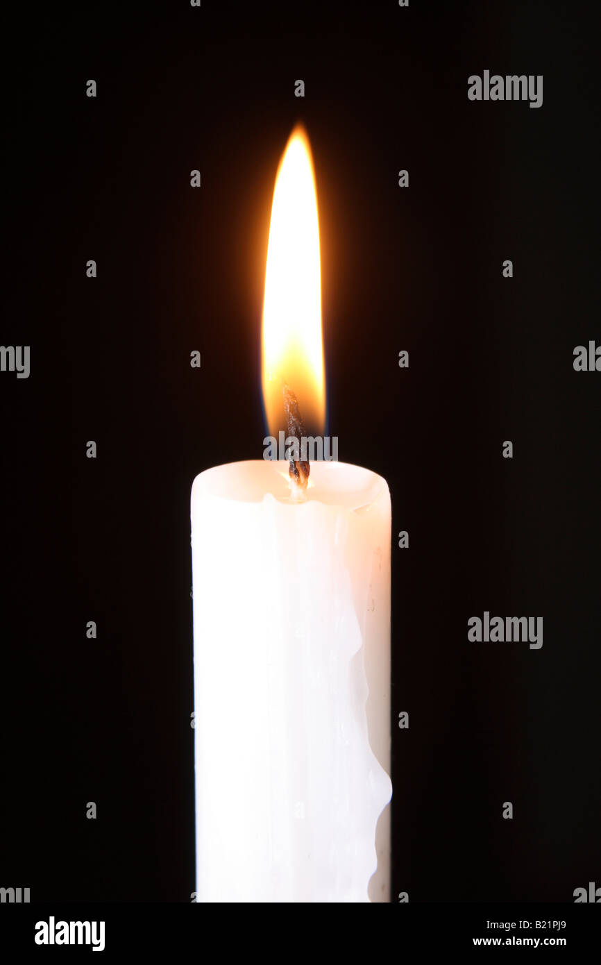 brightly lit candle Stock Photo Alamy