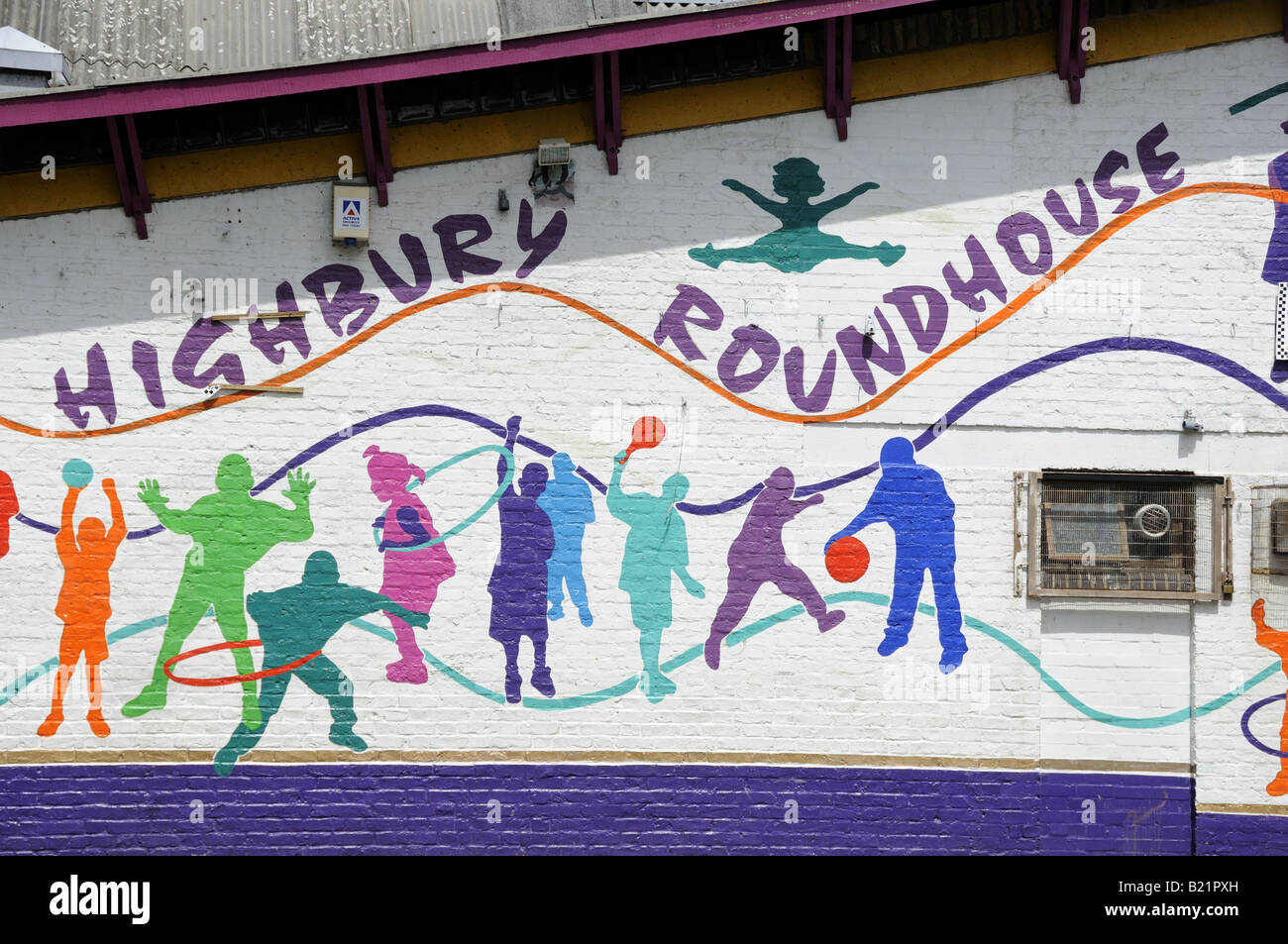 Mural on wall of Highbury Roundhouse Community Centre London UK Stock Photo