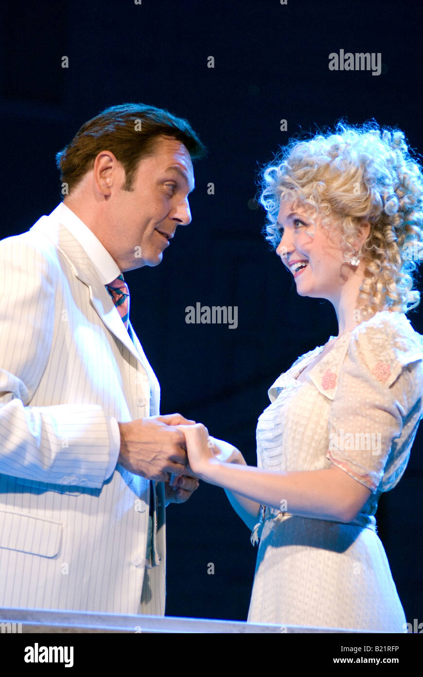 Brian Conley as Professor Harold Hill and Scarlett Strallen as Marian Paroo in The Music Man Stock Photo